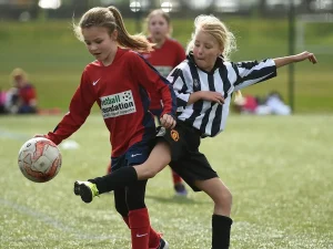 Girls football coaching with Coach Ciarán in Brockwell Park